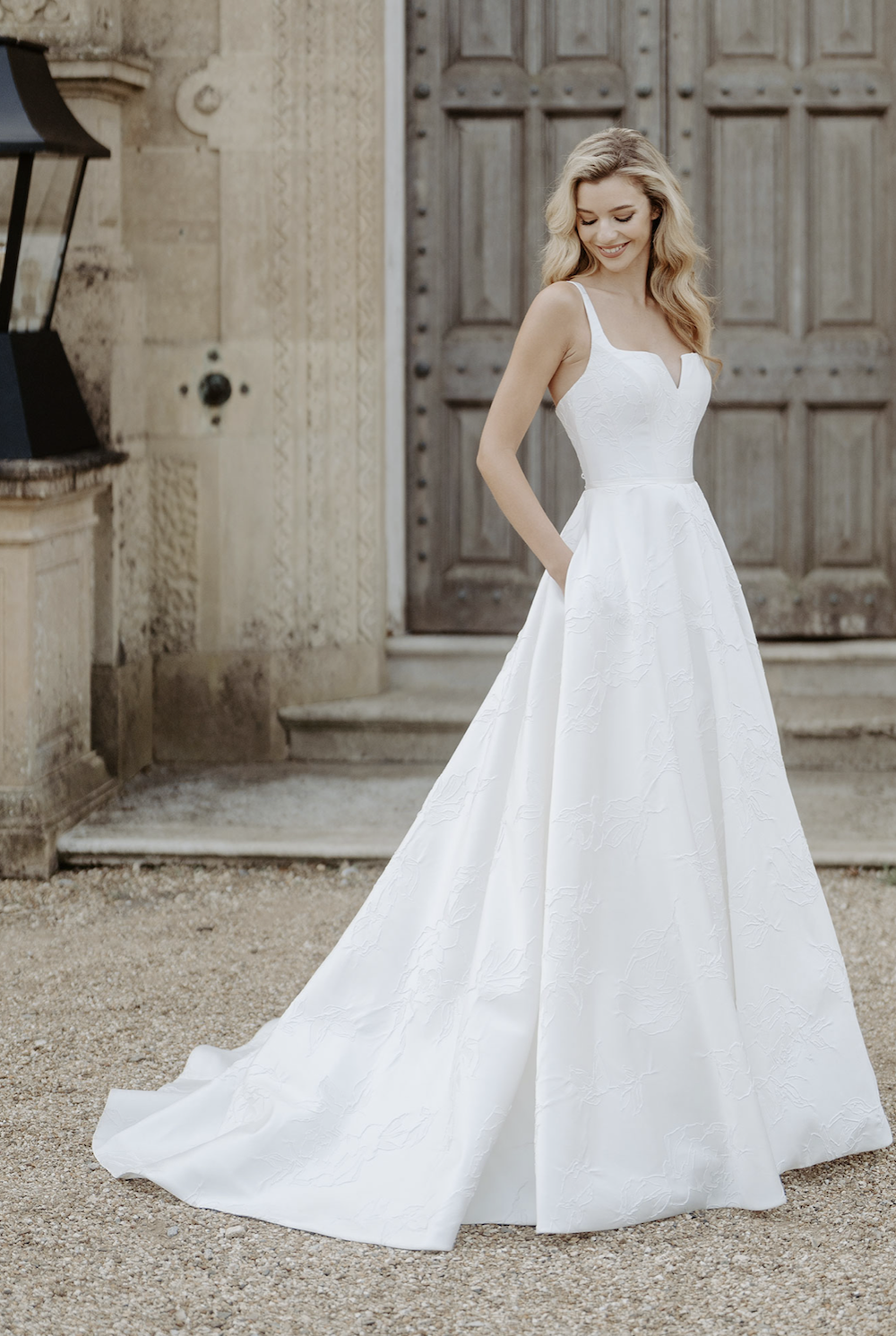 Suzanne Neville Ivory White Bridal Salon